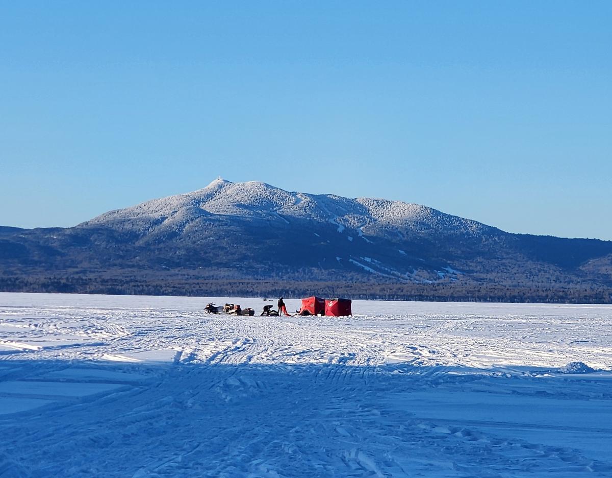 all‑inclusive ice fishing trips Guided ice fishing trip in Maine with heated shack